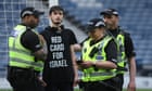 Scotland’s game against Israel delayed as protester chains himself to goal