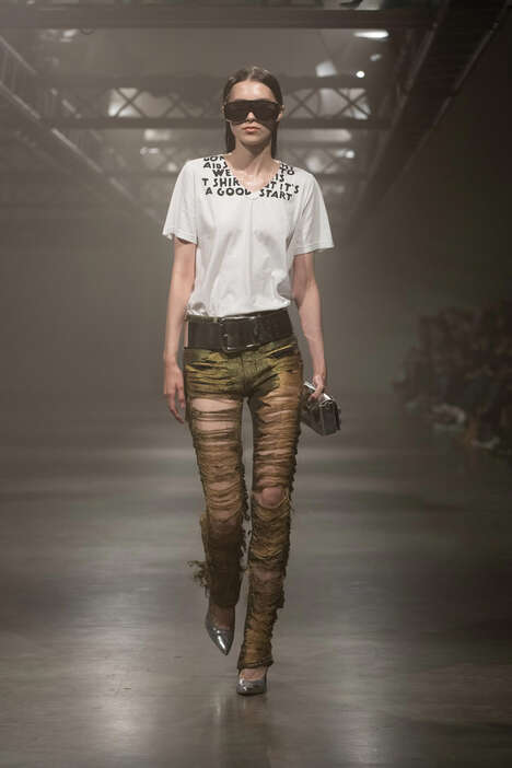 Paint-Adorned Rugged Fashion Boots - MM6 Maison Margiela Presents a New 1460 8-Eyelet Boot (TrendHunter.com)