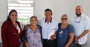Four Belizean families receive keys to new homes through Ministry of Infrastructure Development and Housing’s program