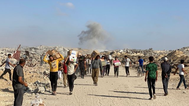 Starving Gazans overrun US-backed food aid hub