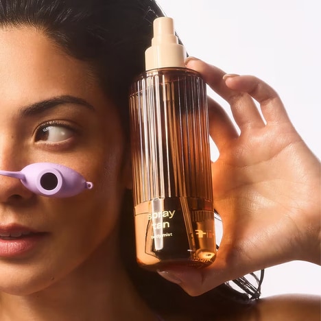 Tanner-Scented Body Mists - The Nostalgic Scent of Tanning Oil Inspired Snif's Spray Tan Body Mist (TrendHunter.com)