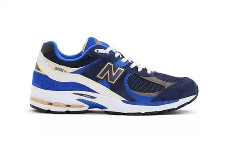 Sporty Collaborative Lifestyle Shoes - FC Porto and New Balance Launch a New 2002R Model (TrendHunter.com)