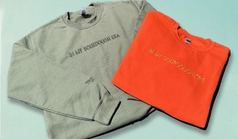 Celebratory Sourdough Bakery Clothing - This Panera Merch is Arriving Alongside The Loaf Story Meal (TrendHunter.com)