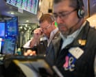 US stock market values tumble amid reports of high layoffs and hiring freezes