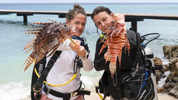 The fearless lionfish huntresses of the Caribbean