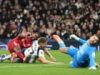 Liverpool cling on to win chaotic clash against nine-man Spurs but Isak injured
