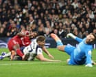 Liverpool cling on to win chaotic clash against nine-man Spurs but Isak injured