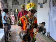 Cuba’s Santeros offer gifts and pray for peace as tensions rise with US