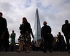 UK unemployment shows surprise fall to 4.9% as pay growth drops to lowest in five years