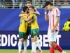 Socceroos secure place in World Cup last 32 after nerve-shredding draw with Paraguay