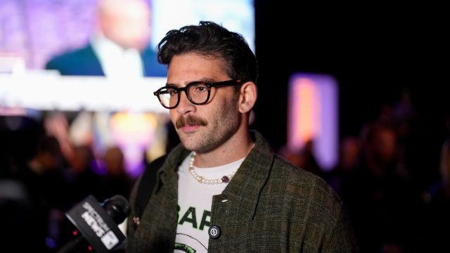 Why have Hasan Piker and Cenk Uygur been banned from entering the UK?