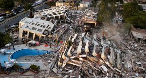 100 US deportees feared dead in Venezuela quake