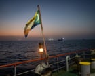 Oil price ‘may fall to $60 a barrel’ as voyages through the strait of Hormuz jump – business live