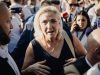 Le Pen affirms presidential run after ruling