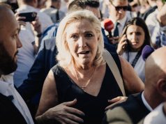 Le Pen affirms presidential run after ruling